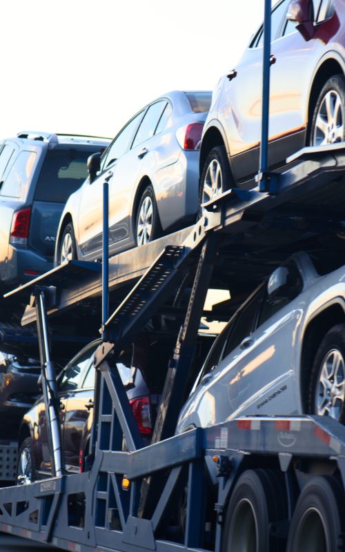 Truck transporting cars